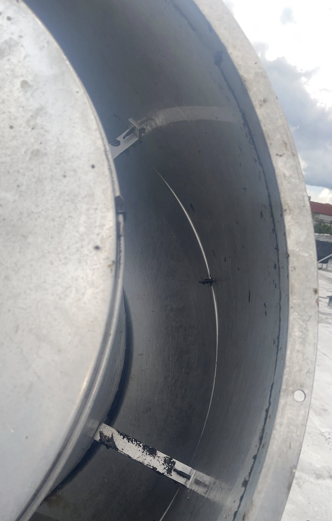 Rooftop exhaust fan housing after grease removal